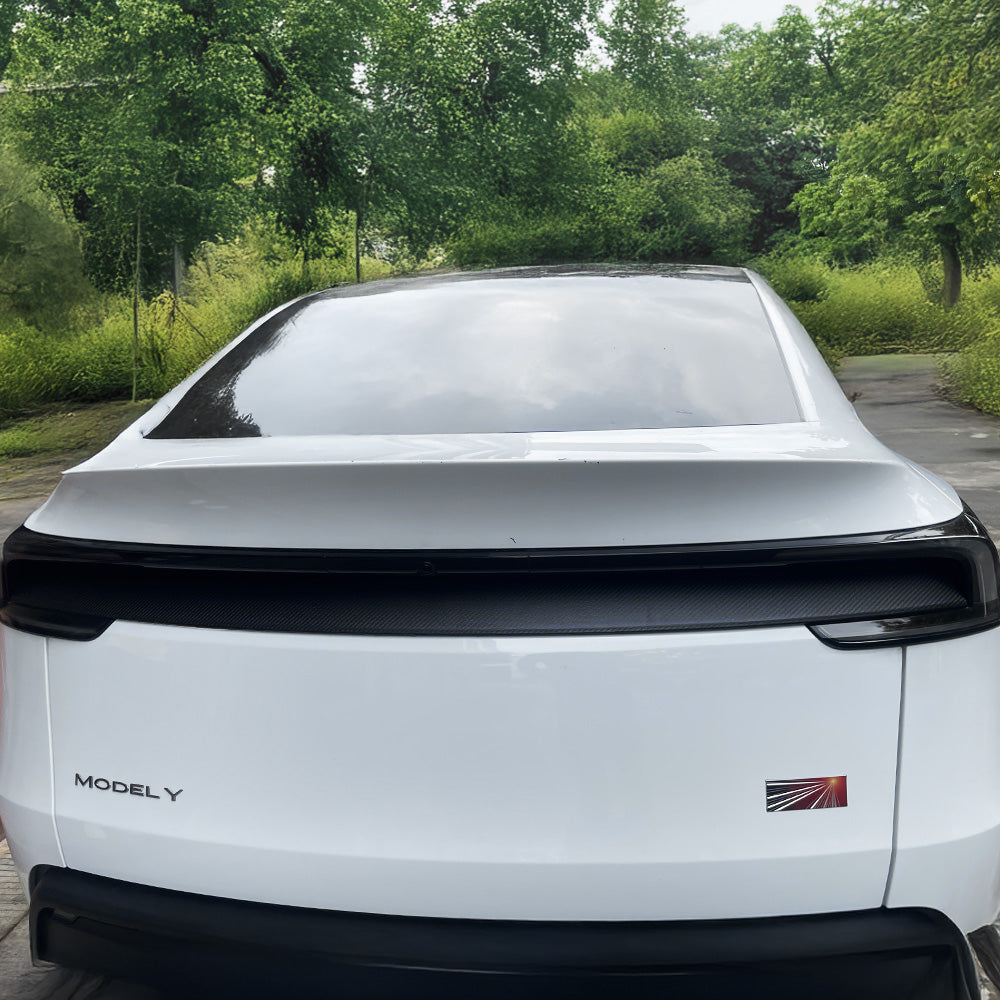 Oblique view of Tesla Model Y Juniper with installed matte carbon fiber lower taillight cover