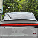 Oblique view of Tesla Model Y Juniper with installed carbon fiber lower taillight cover