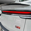 Tesla Model Y Juniper with carbon fiber lower taillight overlay installed
