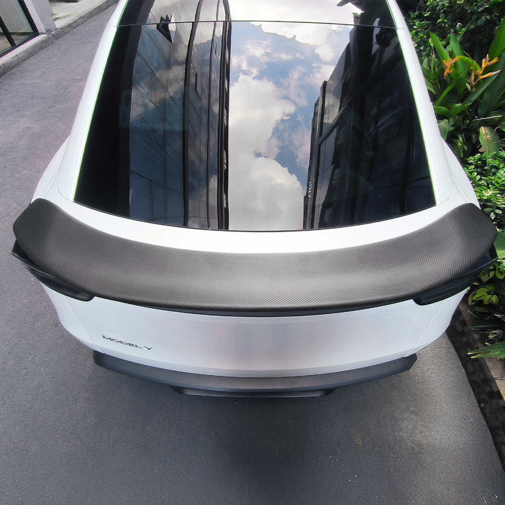 Top view of Tesla Model Y with V-style real carbon fiber spoiler installed-matte