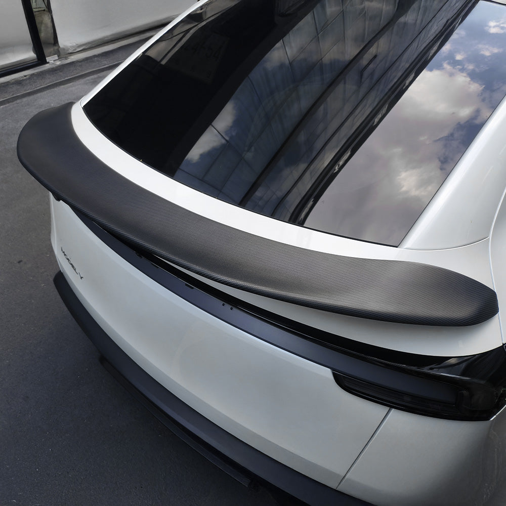 Tesla Model Y with V-style real carbon fiber spoiler installed-matte