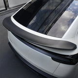 Tesla Model Y with V-style real carbon fiber spoiler installed-matte