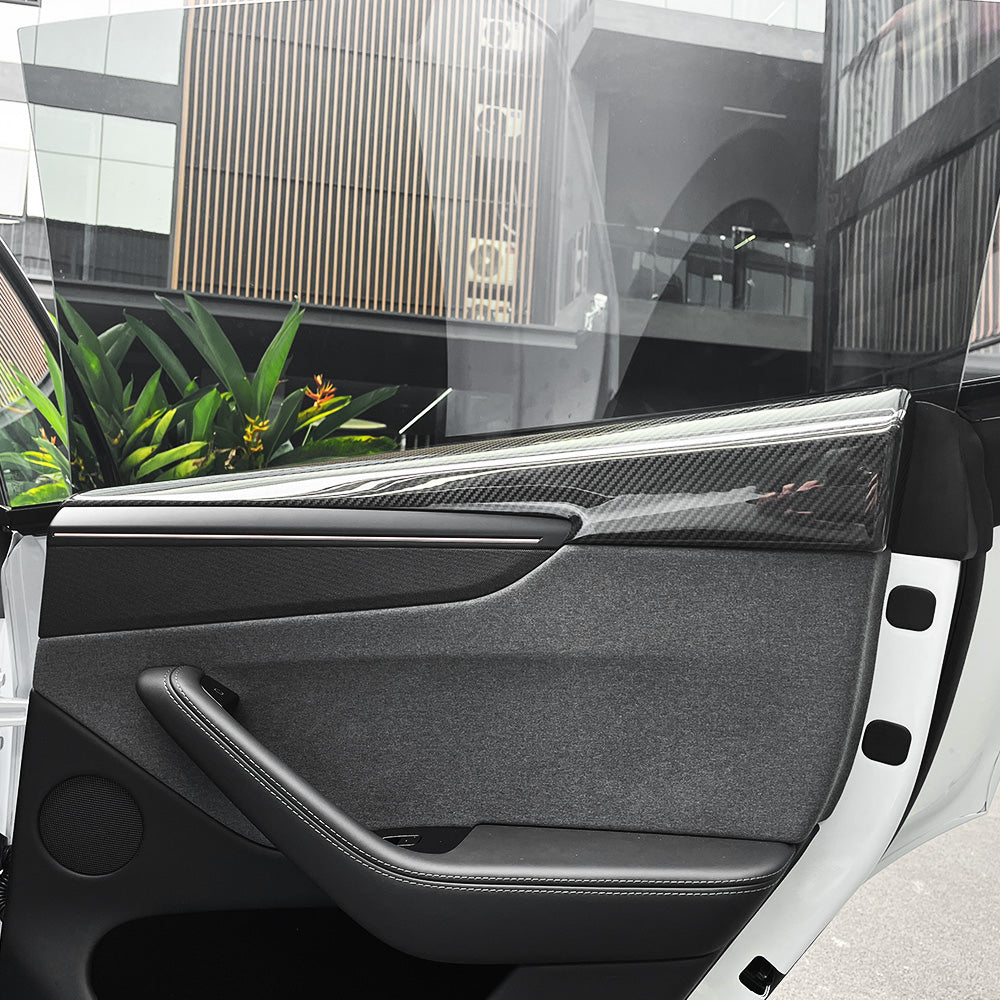 Front view of Tesla Model Y Juniper Carbon Fiber Door Panel Covers