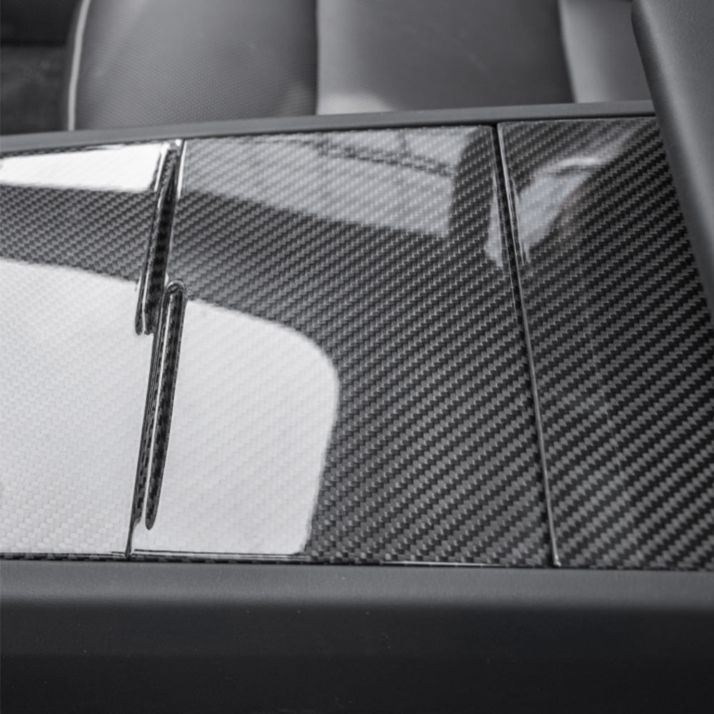 detail of Model Y 2025+ with glossy Carbon Fiber Center Console Overlays Gen 2 installed