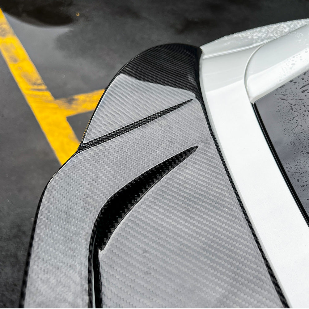 close-up details of Model Y Juniper Carbon Fiber Wing Spoiler