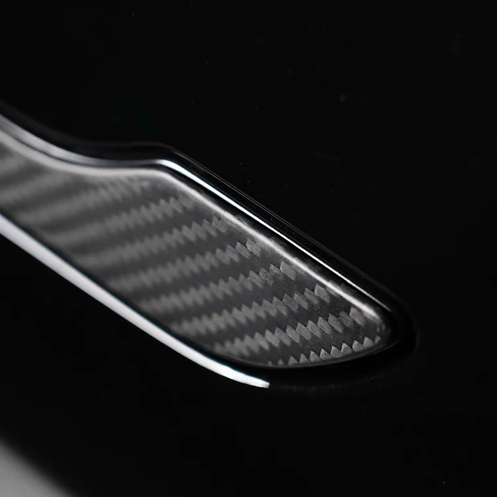close-up of Tesla Model 3/Y Carbon Fiber Door Handle Covers I glossy