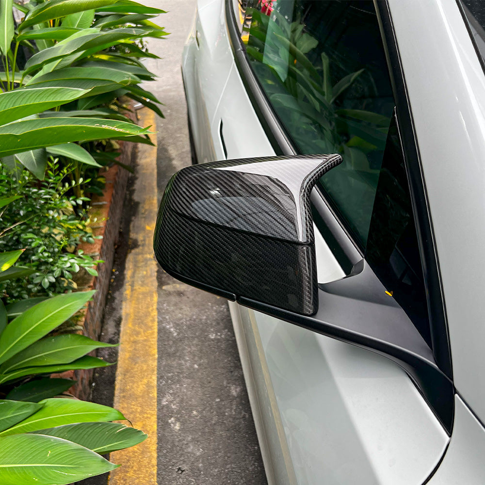 view of GT-Style Carbon Fiber Mirror Caps installed on Tesla Model Y
