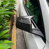view of GT-Style Carbon Fiber Mirror Caps installed on Tesla Model Y
