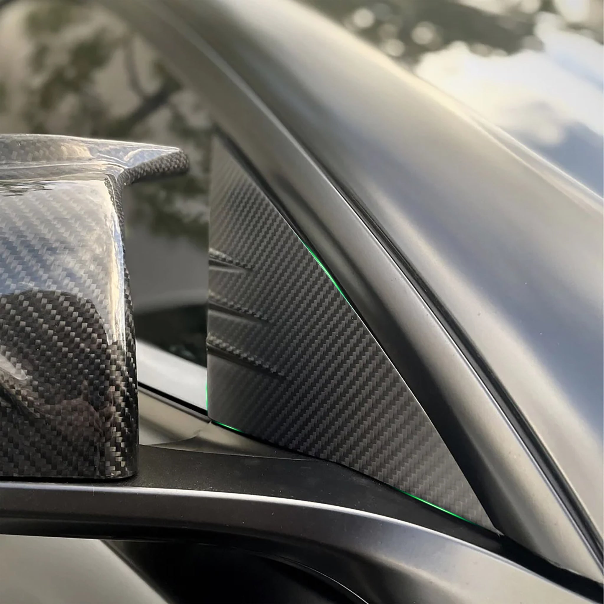 Side view of Tesla Model 3/Y Carbon Fiber A-Pillar Covers installed