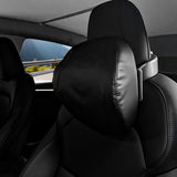 Premium Nappa black Adjustable Headrest Pillow installed on Tesla vehicle