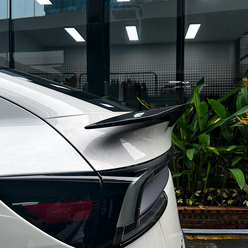 side view of RT-Style Carbon Fiber Spoiler Wing for Model Y Juniper
