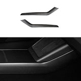 Detailed shot of matte carbon fiber finish on Tesla Model Y Juniper center console side Panel Covers