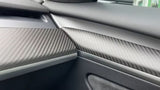 Close up of Real Carbon Fiber Front Door Trim Cover and dashboard cover installed on Tesla model 3/Y