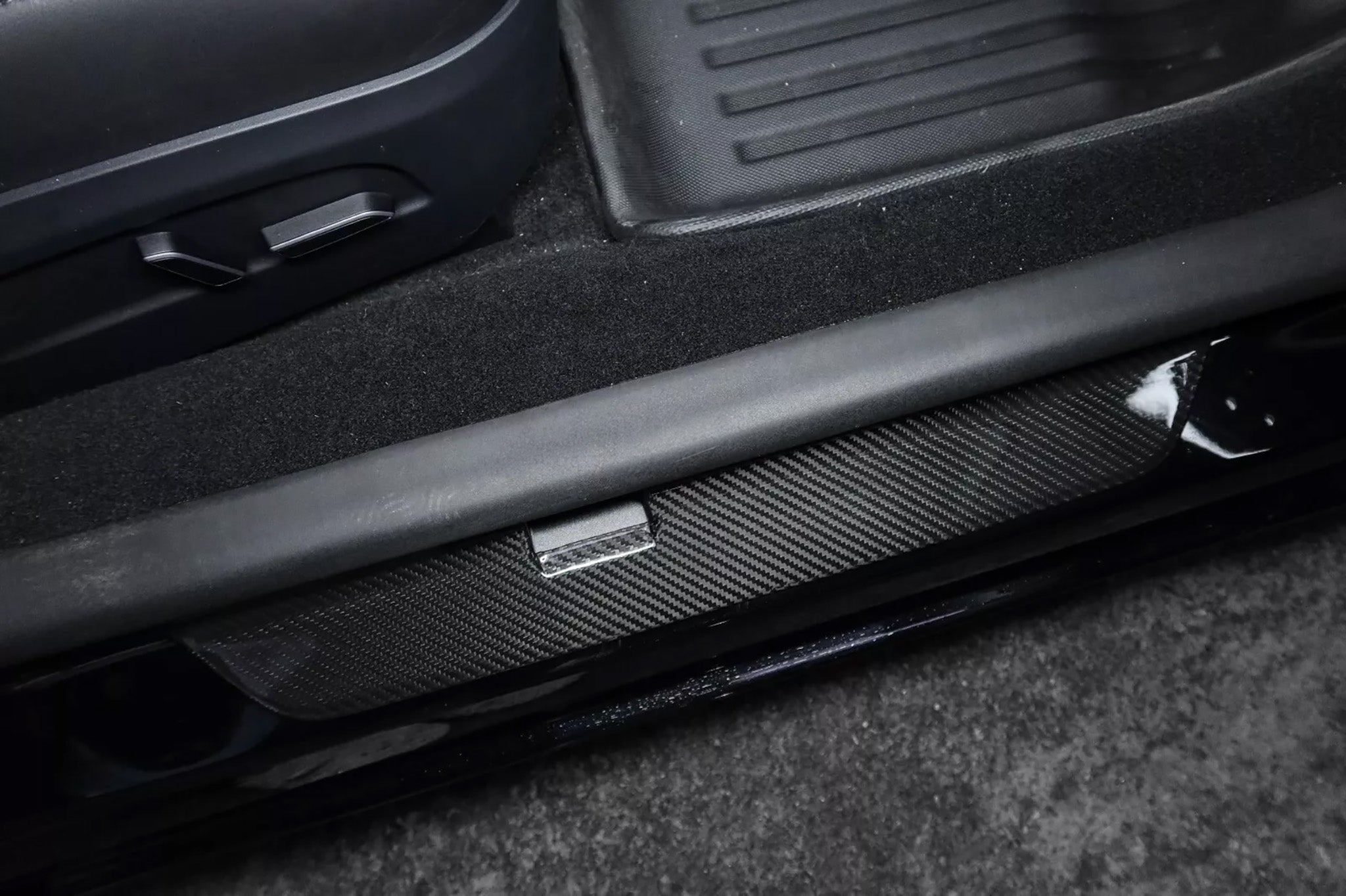 Carbon Fiber Door Sill Covers protector installed on Tesla Model 3