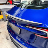 Side view of Carbon Fiber Spoiler (Older Performance Style) installed on Tesla Model 3 Highland