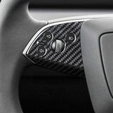 Close-up view of the carbon fiber texture on Tesla Model 3 Highland Steering Wheel Trim