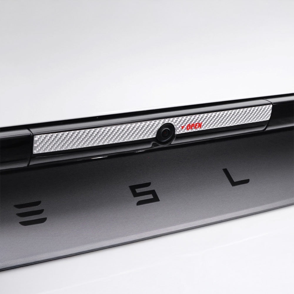 close up of white real carbon fiber texture on Tesla Model Y Juniper Trunk Button Accent Sticker