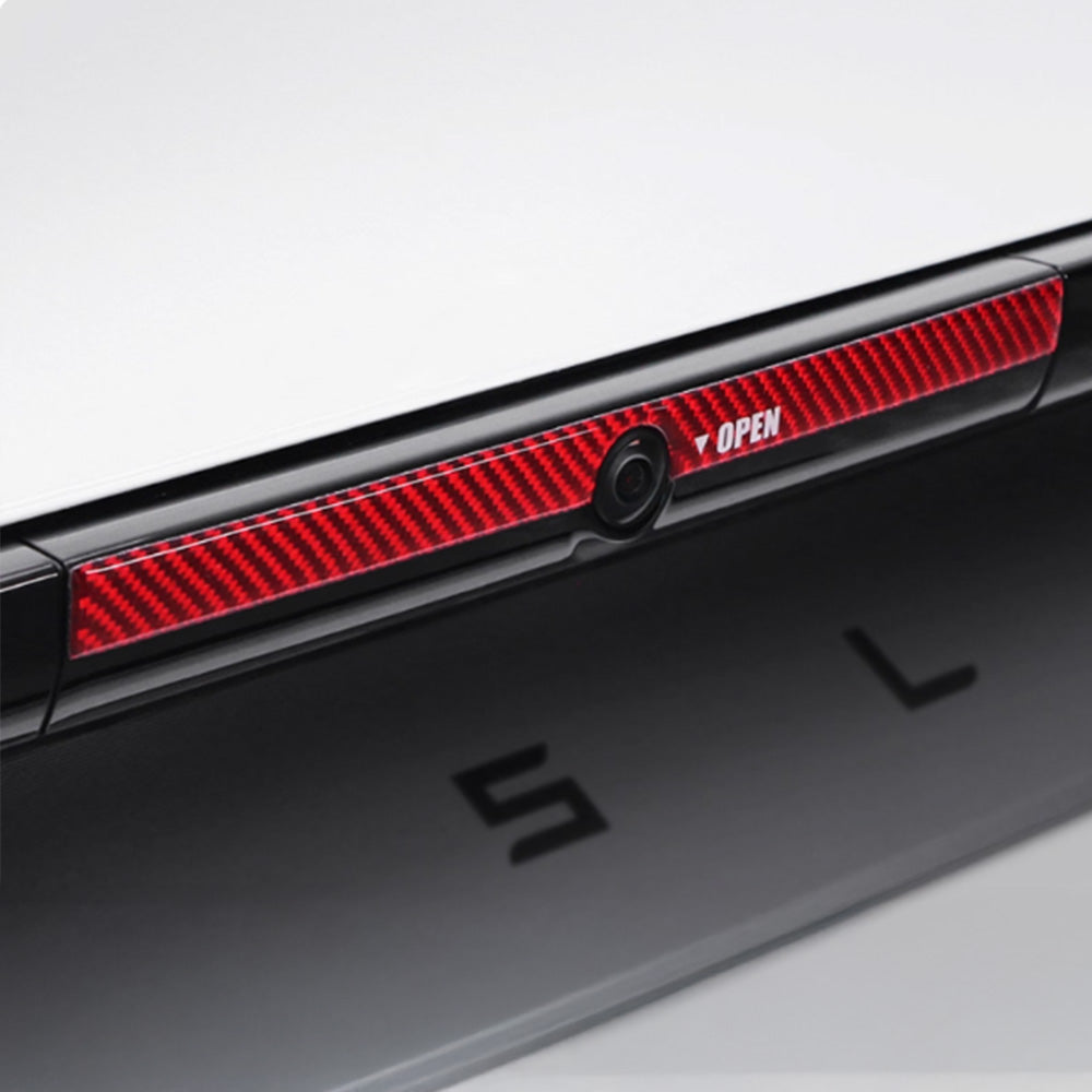 close up of real carbon fiber texture on Tesla Model Y Juniper Trunk Button Accent Sticker