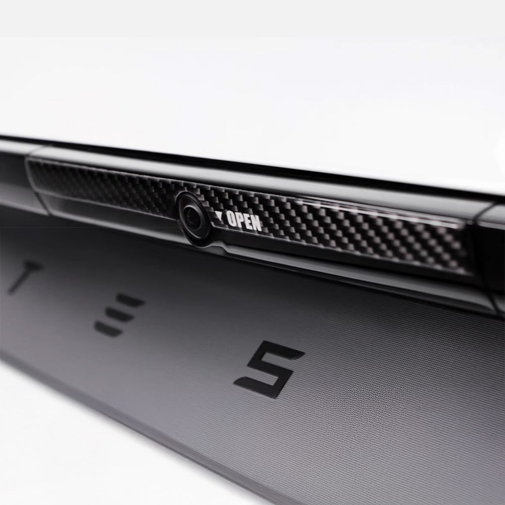 close up of black real carbon fiber texture on Tesla Model Y Juniper Trunk Button Accent Sticker