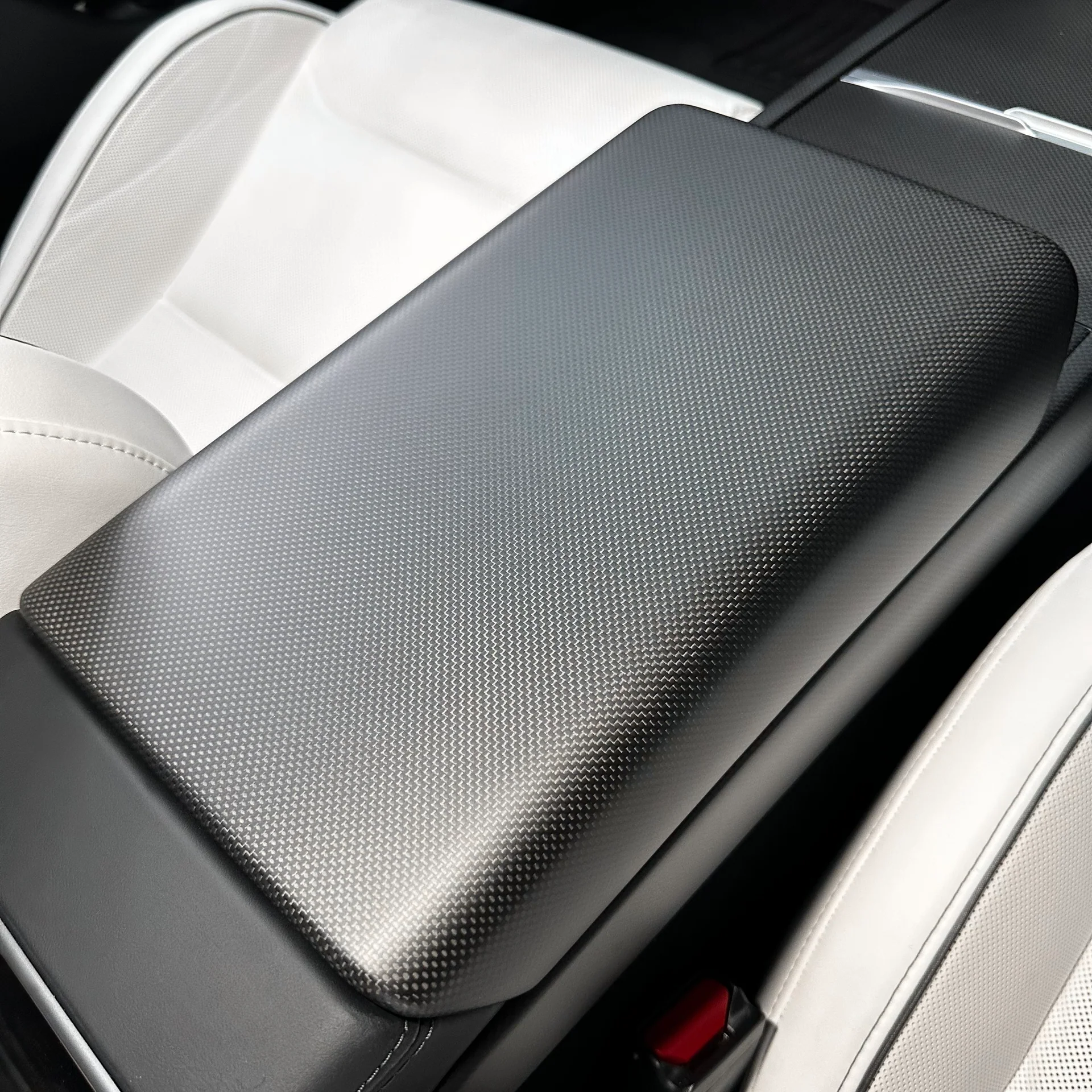 Plain weave Carbon Fiber Armrest Box Cover installed on Tesla Model 3 Highland