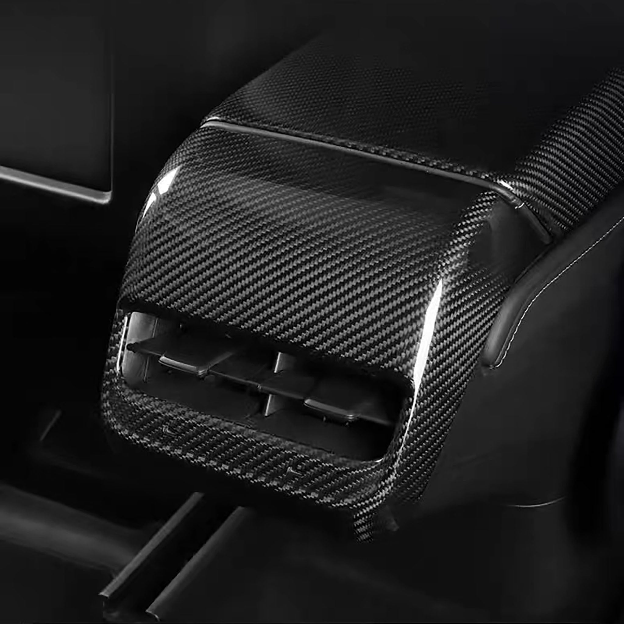 Side view of Carbon Fiber Rear AC Outlet Cover For Tesla Model 3 & Y by Teego