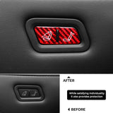 Before vs after installation: Tesla Model Y Juniper with Carbon Fiber Rear Seat Folding Button Trim