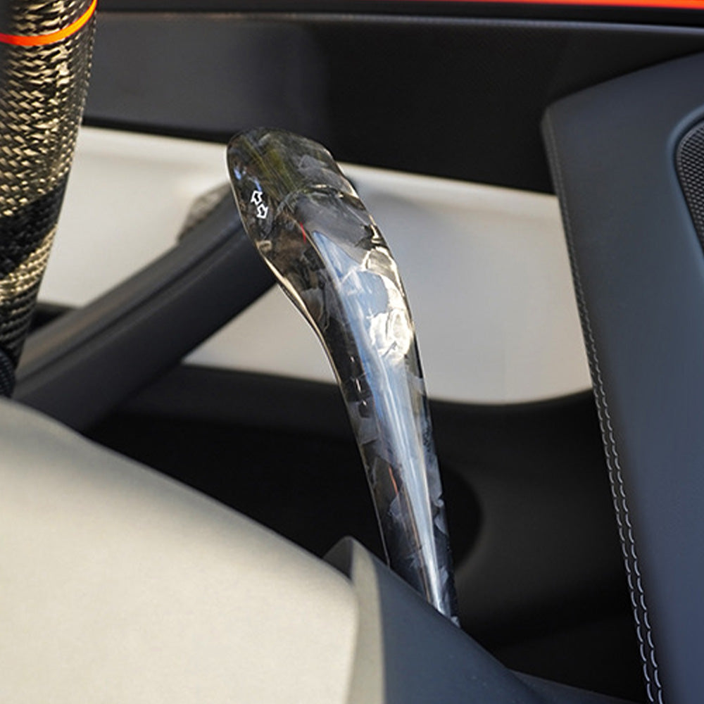side view of Tesla Model Y Juniper Forged glossy Carbon Fiber Turn Signal Stalk Covers