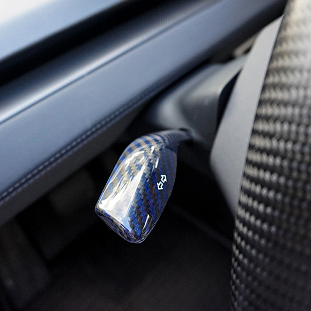 Blue glossy Carbon Fiber Turn Signal Stalk Covers installed on Tesla Model Y Juniper