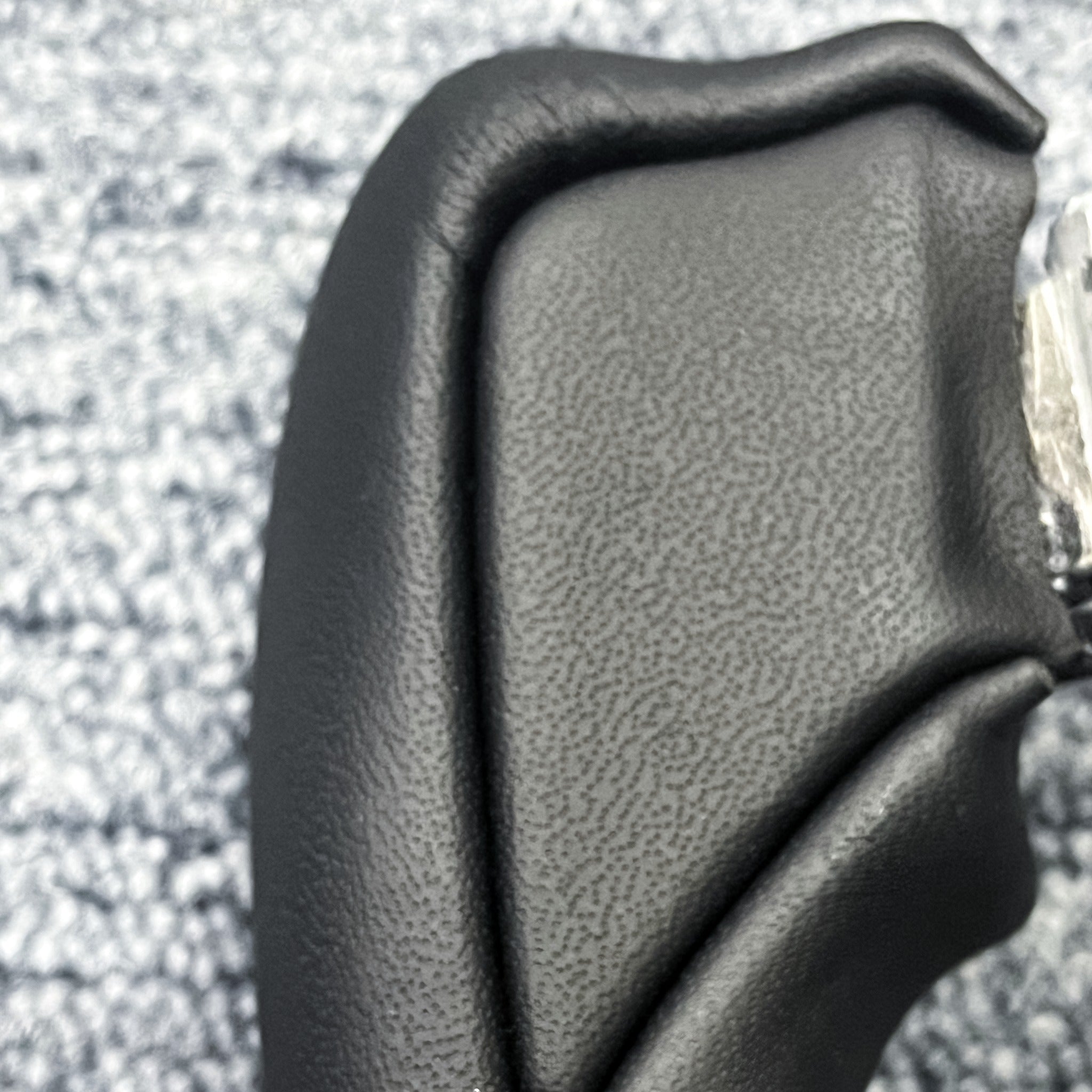 colse up of 2024+ Tesla Model 3 Highland Yoke Steering Wheel