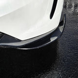 Close up of Carbon Fiber Front Lip installed on white Tesla Model 3 Highland Performance