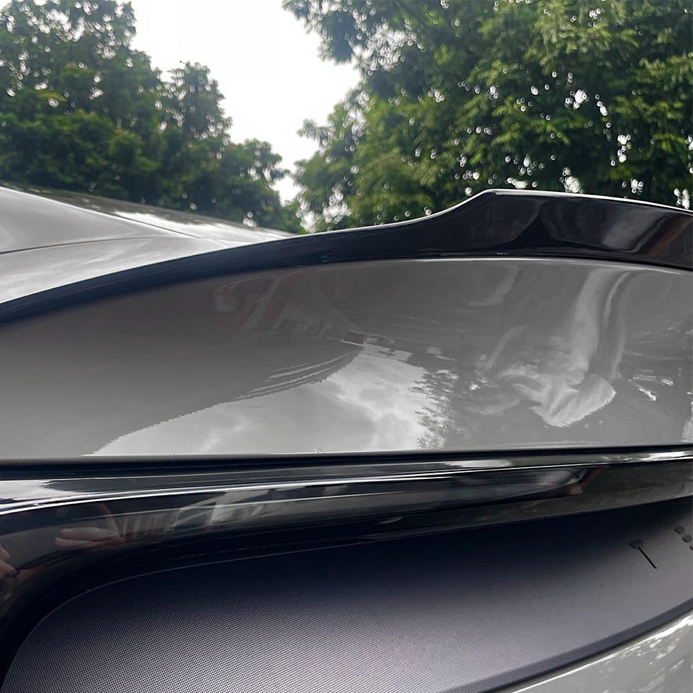 rear detail of Model Y Juniper Carbon Fiber Rear Spoiler Wing–Tesla YL OEM Style installed