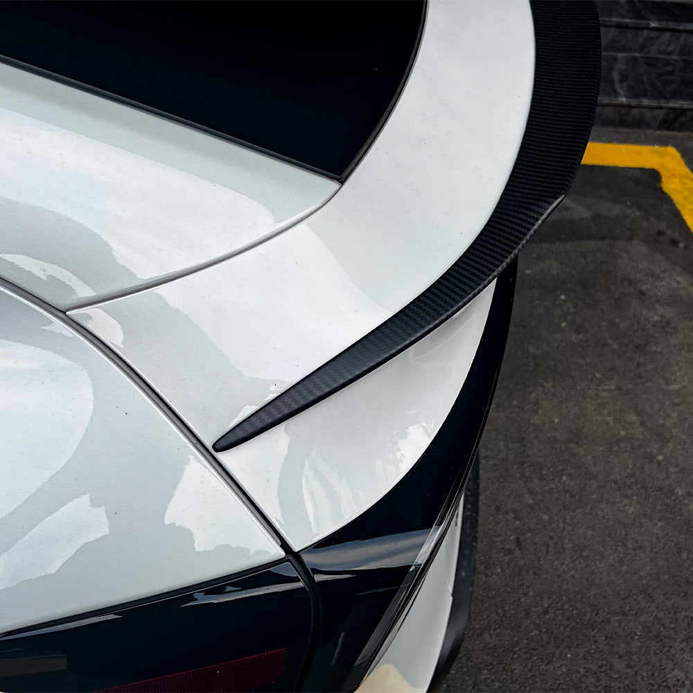 close-up detail of Model Y Juniper Carbon Fiber Rear Spoiler Wing–Tesla YL OEM Style