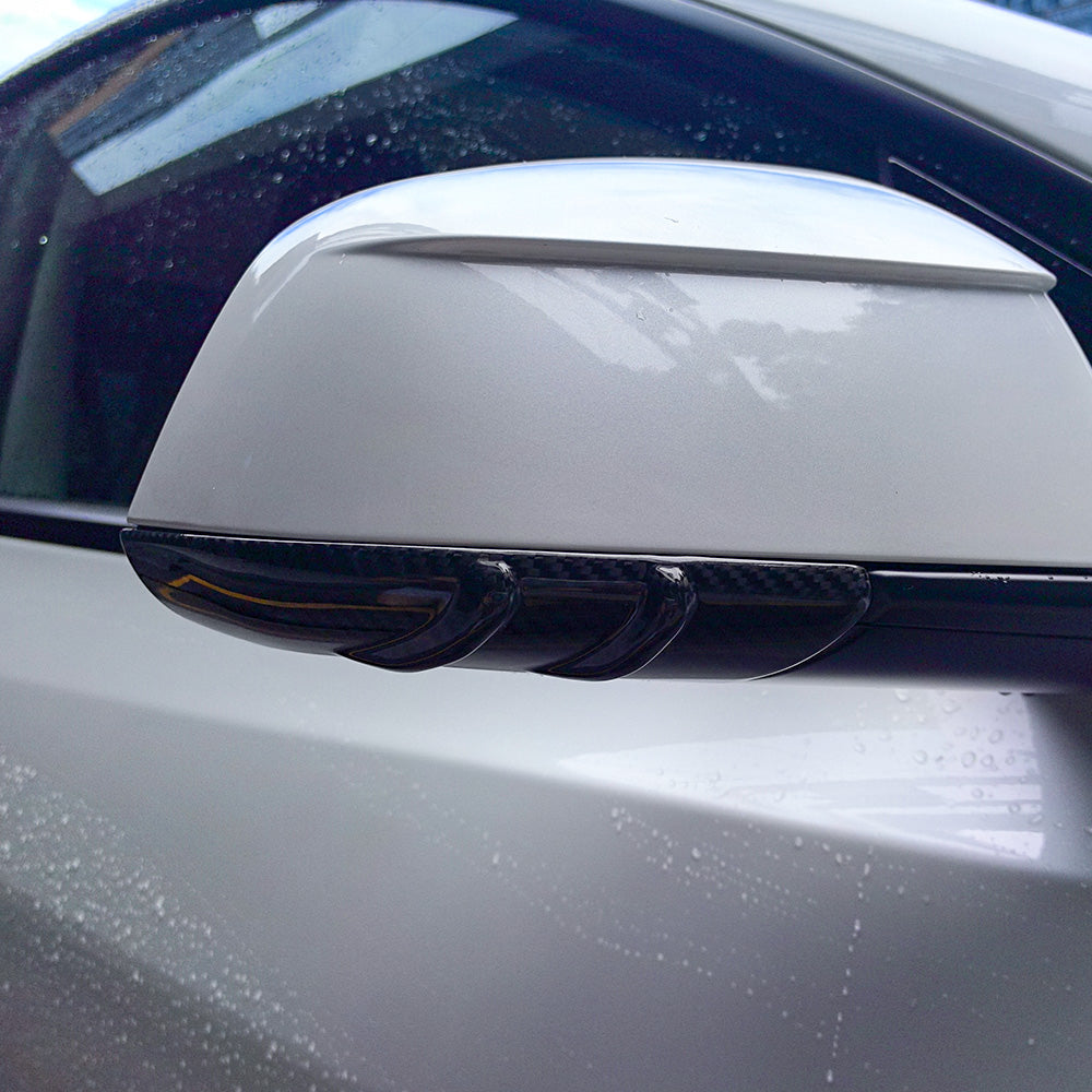 Carbon Fiber Mirror Lower Cover installed on Tesla Model Y -close-up detail shot