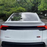 Tesla Model Y Juniper with matte finish carbon fiber lower taillight overlay installed