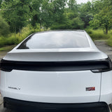Oblique view of Tesla Model Y Juniper with installed matte carbon fiber lower taillight cover