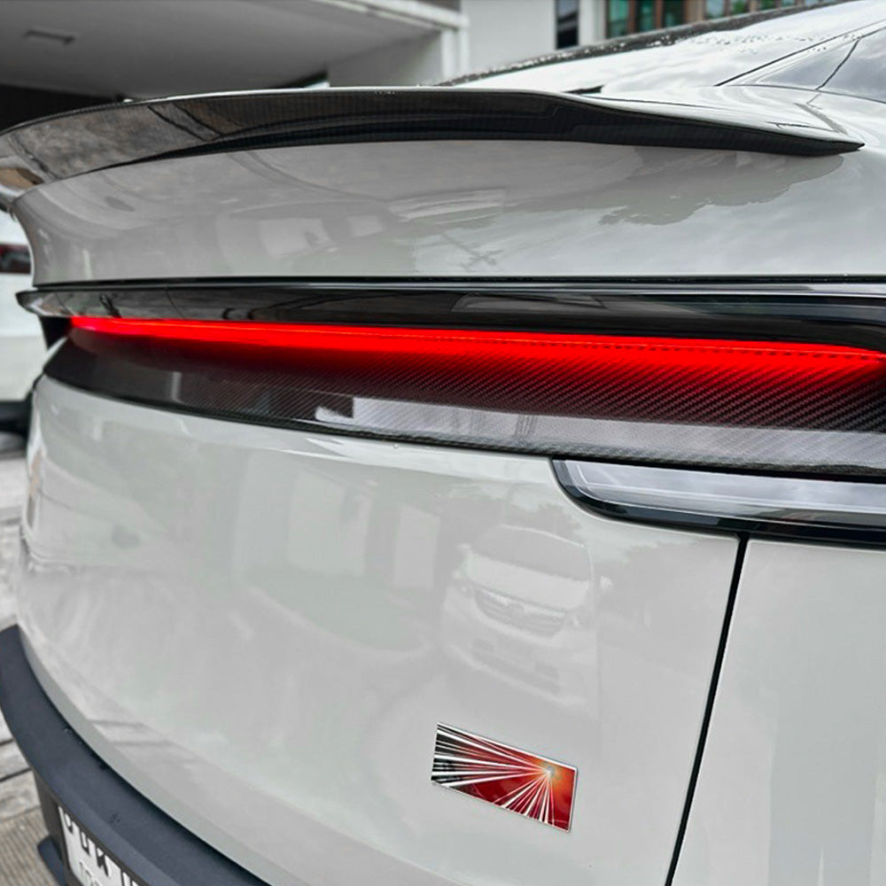 Tesla Model Y Juniper with carbon fiber lower taillight overlay installed