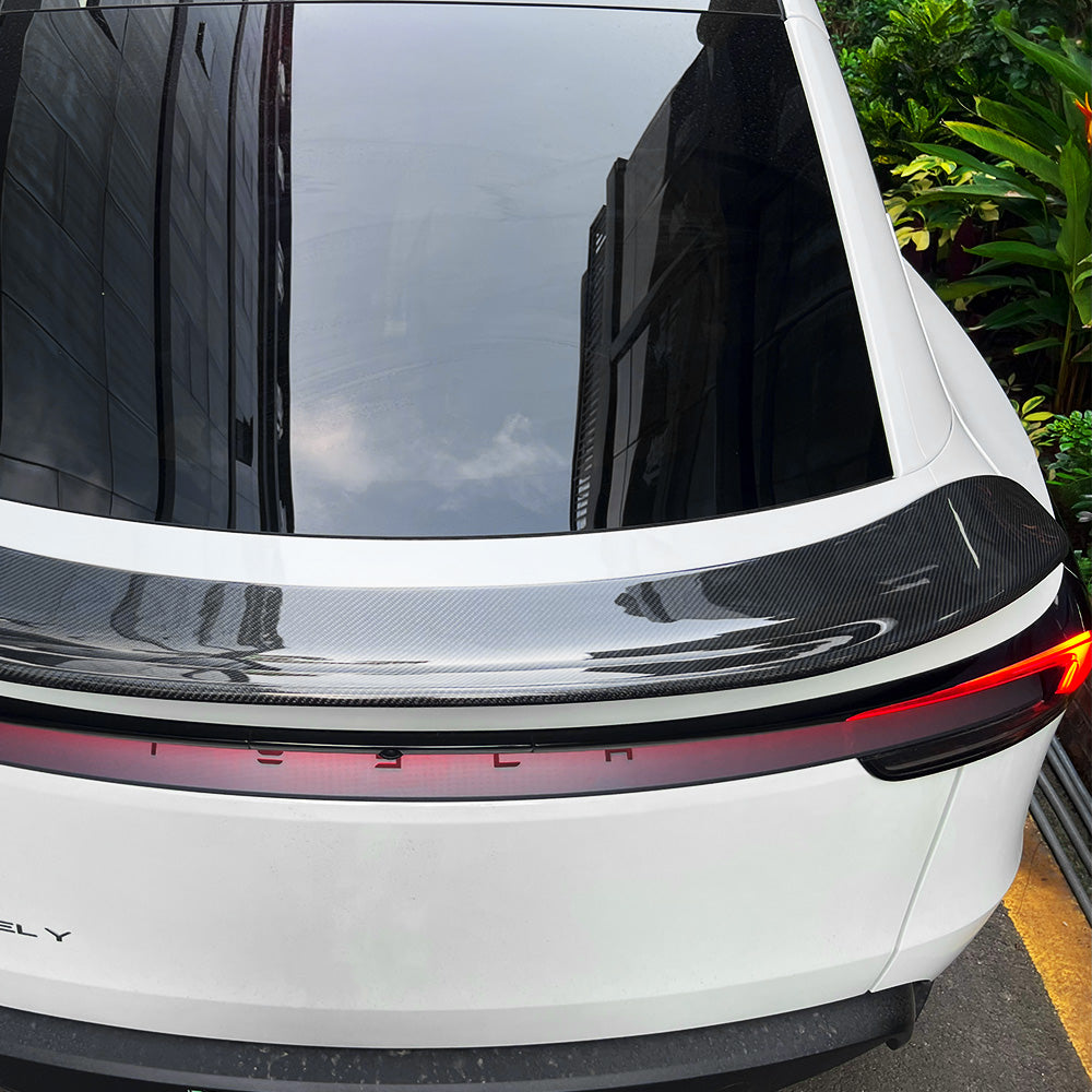 Top view of model Y Juniper V-style carbon fiber spoiler