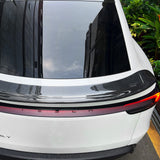 Top view of model Y Juniper V-style carbon fiber spoiler