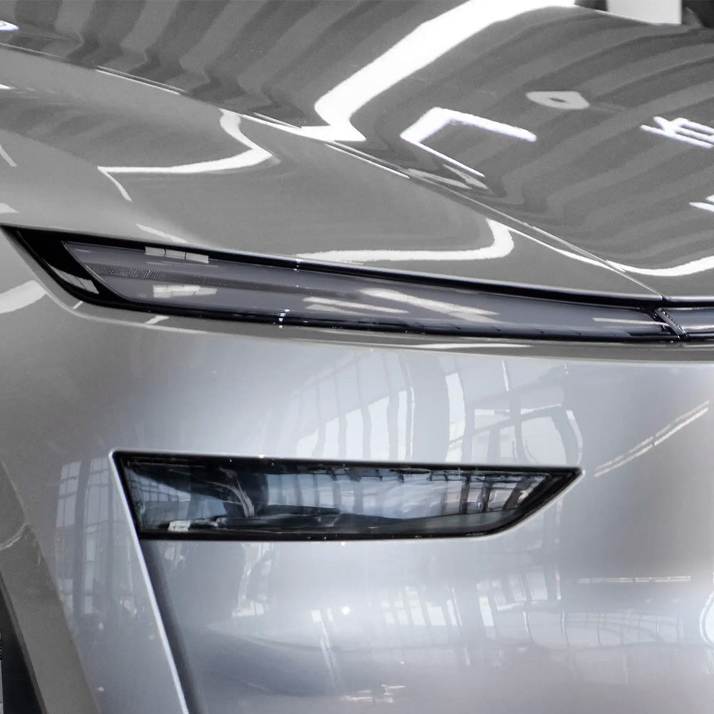 2025+ Tesla Model Y Juniper SmartLight UV-Reactive TPU Headlight Bar Film Covers | Self-Adjusting 70% Tint & Safe Night Driving