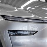2025+ Tesla Model Y Juniper SmartLight UV-Reactive TPU Headlight Bar Film Covers | Self-Adjusting 70% Tint & Safe Night Driving