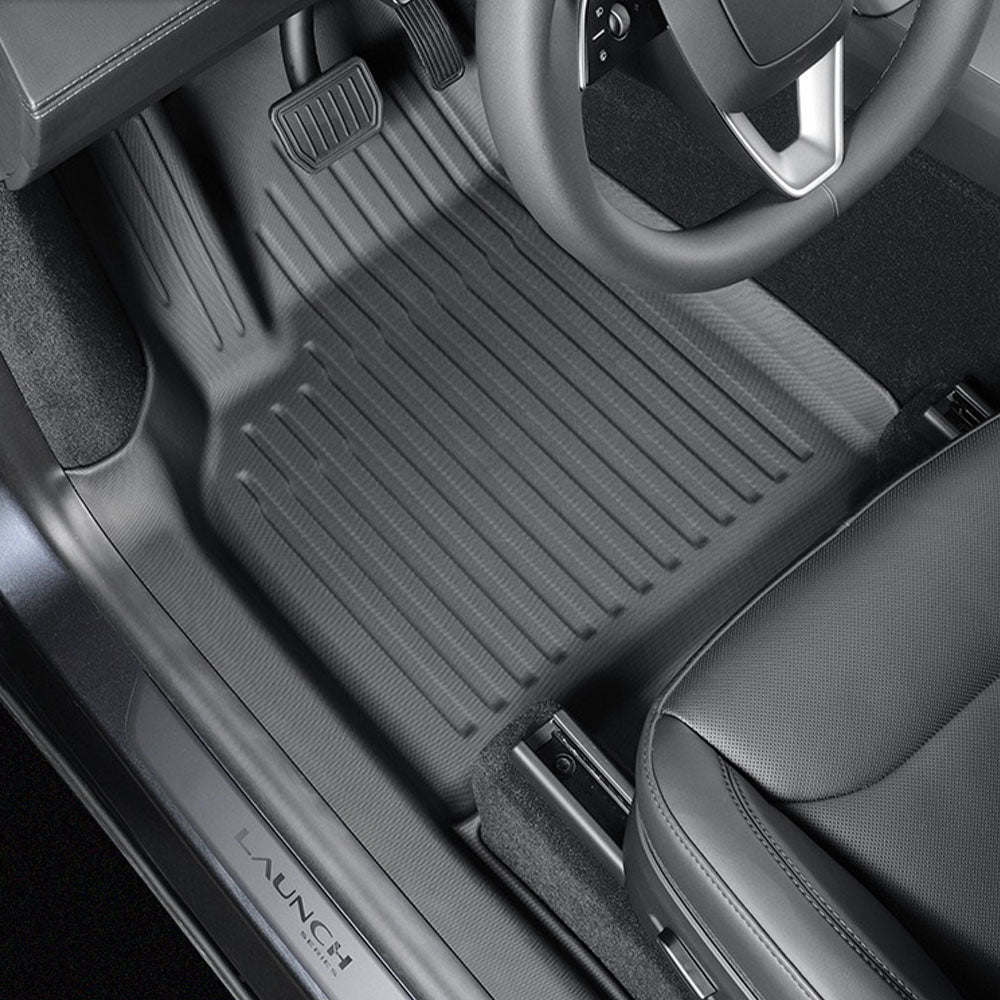 Driver's seat view of Tesla Model Y Juniper All-Weather & Full Coverage Protection Floor Mats