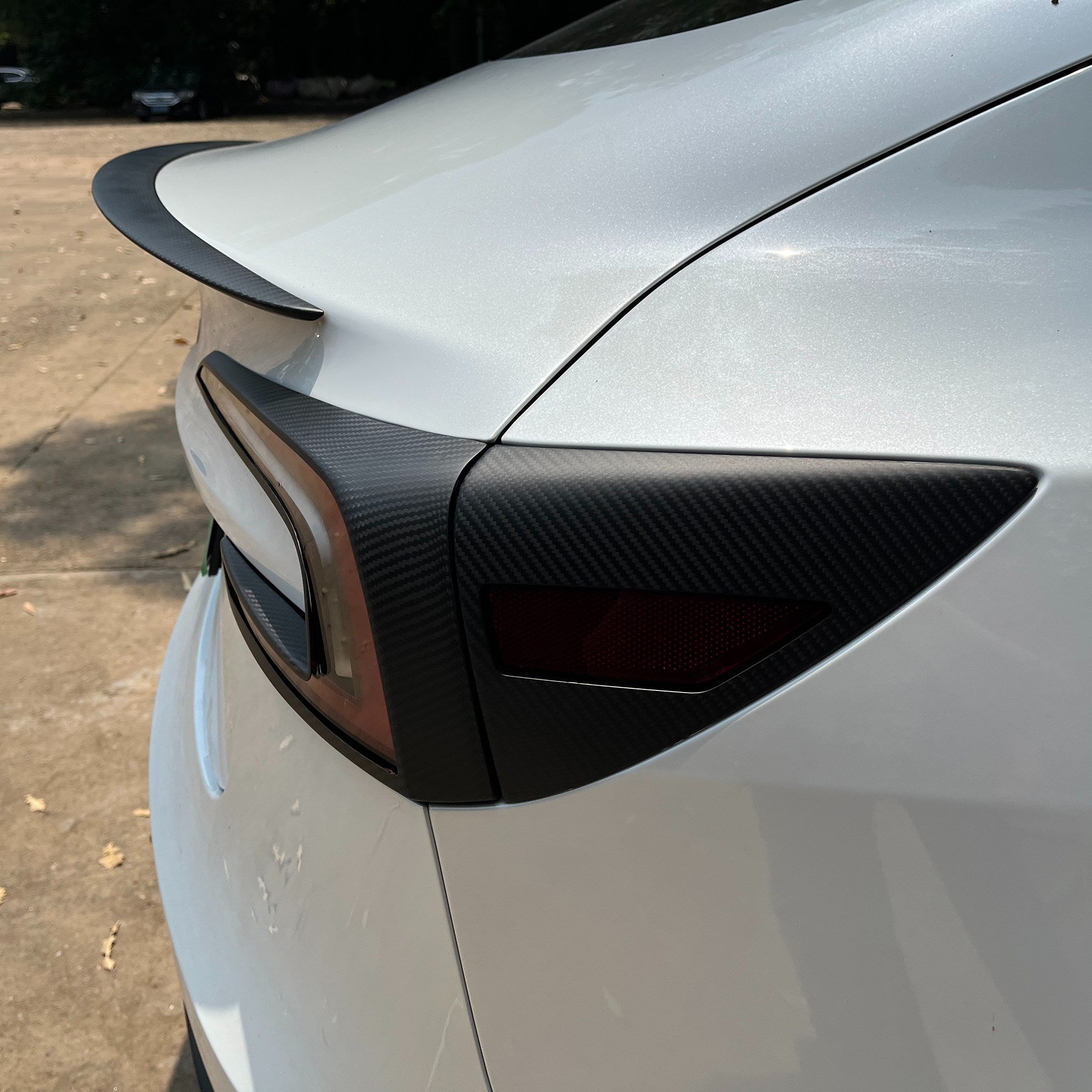 side view of Tesla model 3 Carbon Fiber Charging Port Covers