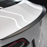 High-Performance Carbon Fiber Spoiler installed on a wihte Tesla Model 3/Y