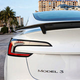 rear detail of RT-Style Real Carbon Fiber Spoiler Wing installed on 2024+ Tesla Model 3 Highland