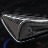 close up detail of model Y carbon fiber side camera cover