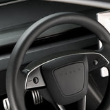 Tesla model Y with real carbon fiber steering wheel trim cover installed