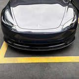 Front view of Real Carbon Fiber Aero Front Lip Spoiler installed on 2024+ Tesla Model 3 Premium