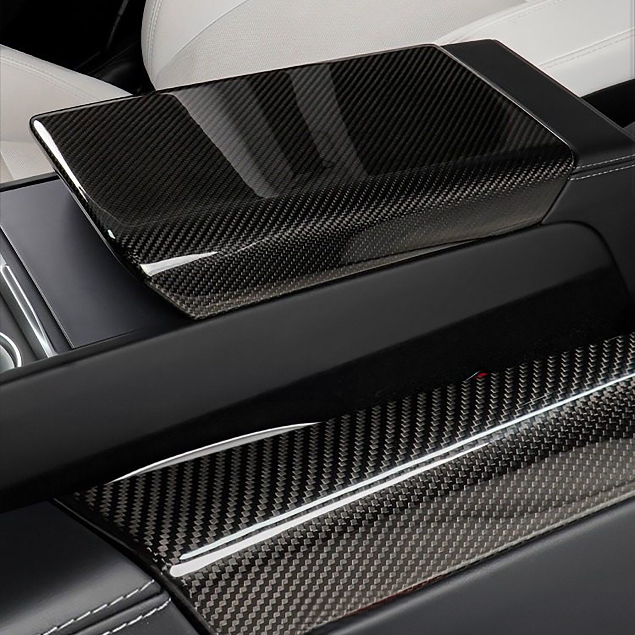 Carbon Fiber Armrest Box Cover installed on Tesla Model 3 Highland