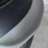 Texture detail of Real Carbon Fiber V-Style Spoiler installed on Tesla Model 3 Highland (2024+)
