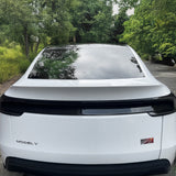 Oblique view of Tesla Model Y Juniper with installed real carbon fiber lower taillight cover